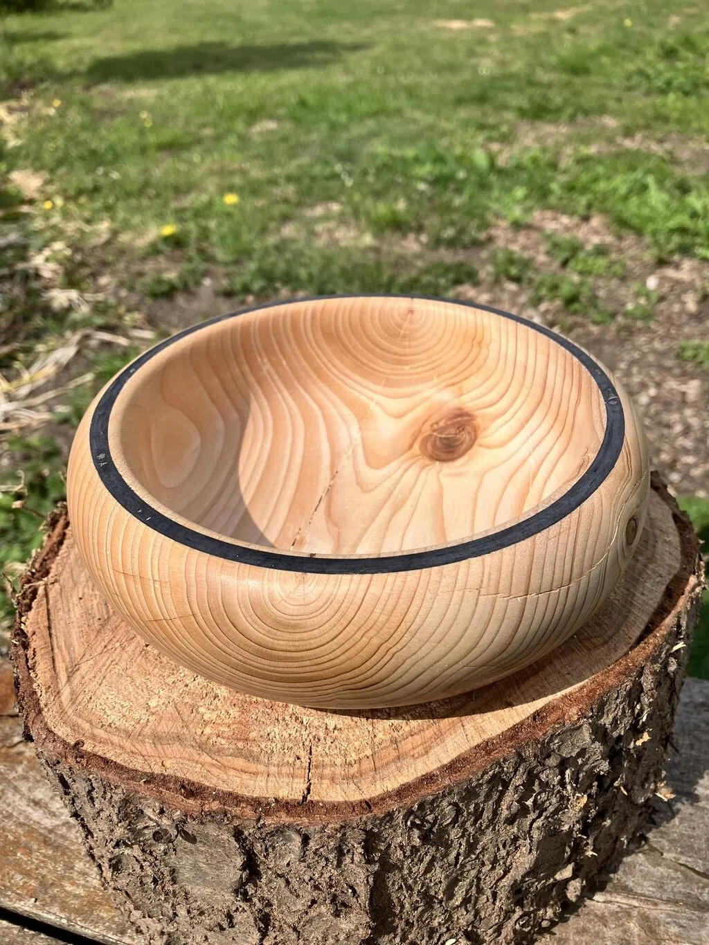 Handcrafted walnut bowl turned on a lathe