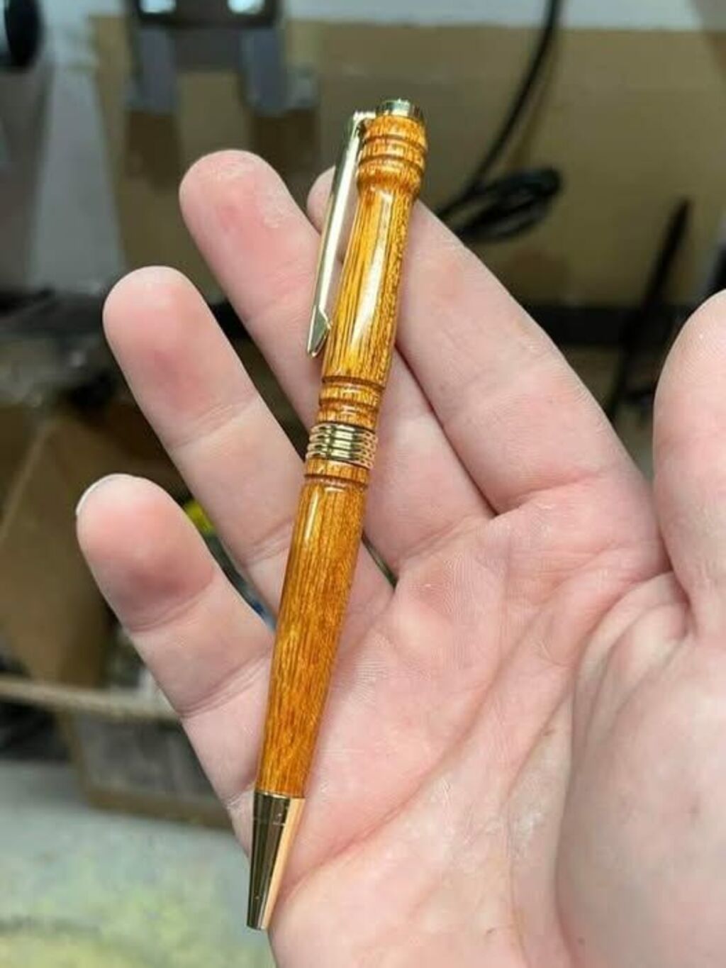 Handcrafted wooden fountain pen with brass accents