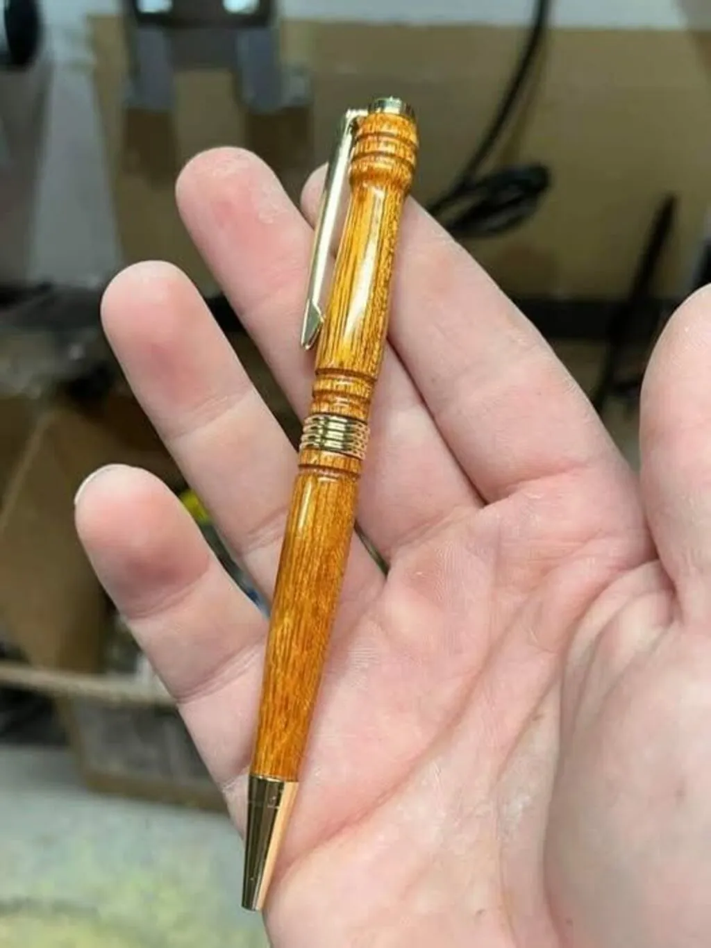 Handcrafted wooden fountain pen with brass accents